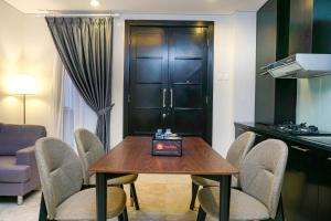 Modern 2BR with Private Lift at Masterpiece The Epicentrum Kuningan Apartment By Travelio