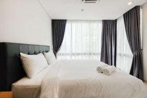Spacious 2BR at Empyreal The Epicentrum Kuningan Apartment By Travelio