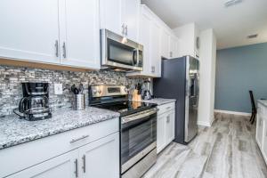 Four-Bedroom Townhouse room in Enchanting 4 Bedroom Townhome with Pool townhouse