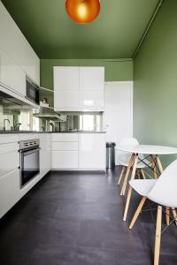 Appartements Veeve - Emerald Exuberance : photos des chambres