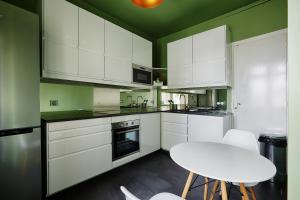 Appartements Veeve - Emerald Exuberance : photos des chambres