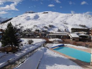 Appartements Ecrins 6 n°1 : vue sur piscine et telesiege. Ski in/out : photos des chambres