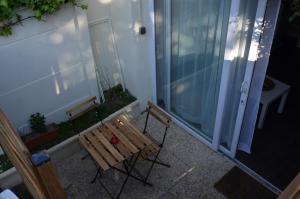 Maisons de vacances Joli studio au calme dans un jardin privatif : photos des chambres