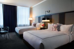 Queen Room with Two Queen Beds room in Kimpton Cardinal Hotel an IHG Hotel