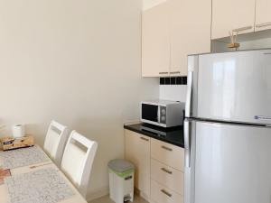 Flame Tree Residence by Patcha