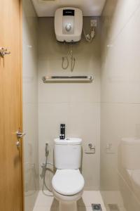 Simply and Homey Studio Apartment at Tree Park City By Travelio