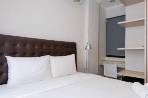 Warm and Relax 1BR at Asatti Garden House Apartment By Travelio