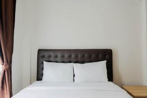 Homey and Simple 1BR at Asatti Apartment By Travelio