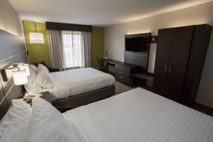 Standard Queen Room with Two Queen Beds room in Holiday Inn Express Wilmington an IHG Hotel