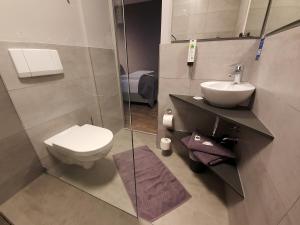 Three-Bedroom Apartment room in Hotel Falkenturm