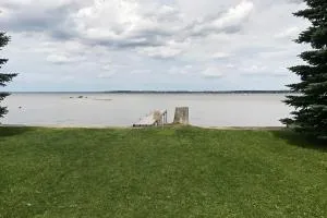Peaceful Lakefront Houghton Lake Property with Patio - Gladwin