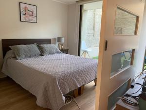 Santiago Centro - Dpto Boutique con Patio Privado