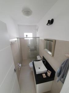 Apartamento super completo na praia de Taperapuan