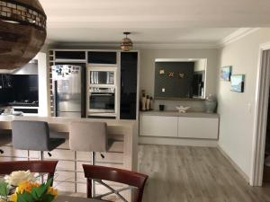 Apartamento térreo com piscina e ótima localização