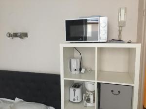 Appartements Studio 2 pers en vieille ville parking gratuit - by La Source d'OrFee : photos des chambres