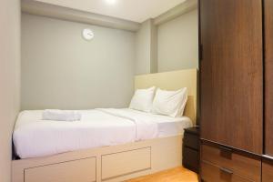 Exclusive and Spacious 1BR Apartment at Bassura City By Travelio