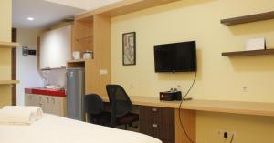 Brand New Studio Beverly Dago Apartment near ITB By Travelio