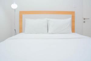 Cozy 2BR at Springlake Summarecon Bekasi Apartment By Travelio