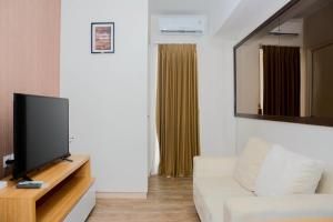 Cozy 2BR at Springlake Summarecon Bekasi Apartment By Travelio