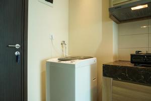 Cozy Studio Apartment at Nine Residence connected to Mall By Travelio