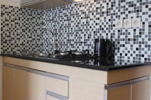 Premium 2BR Tamansari Panoramic Apartment By Travelio