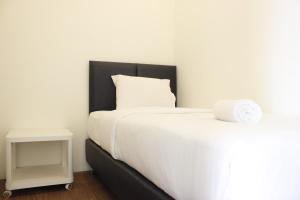 Premium 2BR Tamansari Panoramic Apartment By Travelio