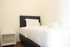 Premium 2BR Tamansari Panoramic Apartment By Travelio