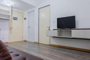 Elegant and Convenient 2BR M-Town Residence Apartment By Travelio