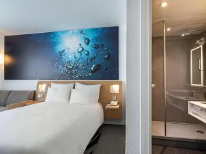 Hotels Novotel Evry Courcouronnes : photos des chambres