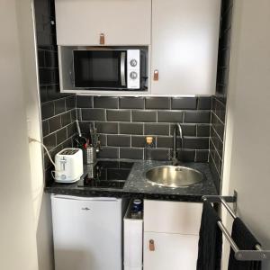 Appartements Studio hyper centre avec Parking : photos des chambres