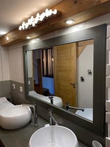 Appartements La Grange Auguste avec Sauna Jacuzzi : photos des chambres