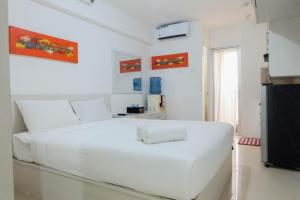Tidy Studio Apartment at Bassura City near Shopping Mall By Travelio