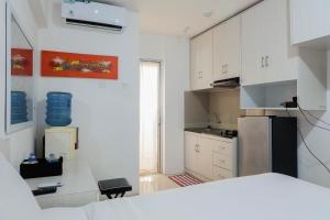 Tidy Studio Apartment at Bassura City near Shopping Mall By Travelio