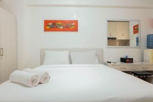 Tidy Studio Apartment at Bassura City near Shopping Mall By Travelio
