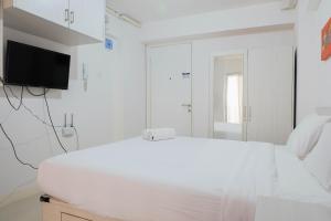 Tidy Studio Apartment at Bassura City near Shopping Mall By Travelio