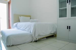 Cozy Studio Apartment at Margonda Residence 4 By Travelio