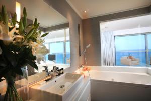 Three-Bedroom Suite room in Olympic Residence Deluxe Apartments