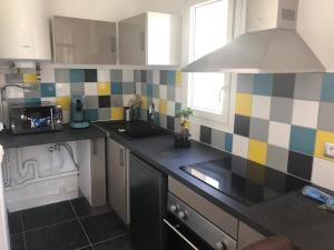 Appartements studio vue sur le Port saint Goustan classe 3 etoiles! : photos des chambres