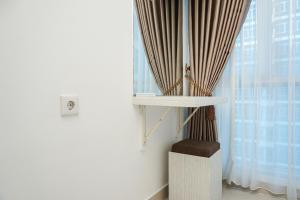 New Furnished 2BR Apartment at Capitol Park Residence By Travelio