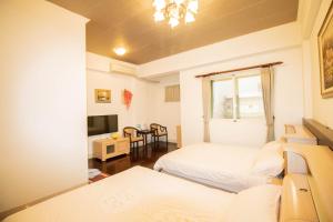 Phòng Tiêu Chuẩn 4 Người (Standard Quadruple Room)