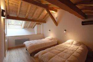 Appartements Les Cabasses 6 - Accommodation in a village house : photos des chambres