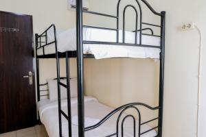 Homey 2BR at Serpong Greenview Apartment By Travelio