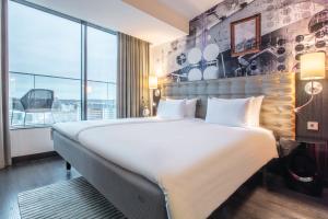 Junior Suite with Balcony room in Radisson Blu Riverside Hotel