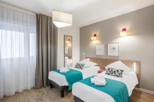 Appart'hotels Appart'City Classic Annemasse Centre - Pays de Geneve : photos des chambres