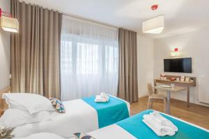 Appart'hotels Appart'City Classic Annemasse Centre - Pays de Geneve : photos des chambres