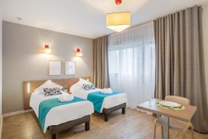 Appart'hotels Appart'City Classic Annemasse Centre - Pays de Geneve : photos des chambres