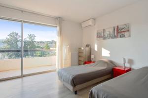 Appartements Flat w terrace parking and beautiful view in Villeneuve-Loubet - Welkeys : photos des chambres