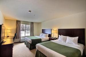 Queen Room with Two Queen Beds room in Cobblestone Inn & Suites - Brillion