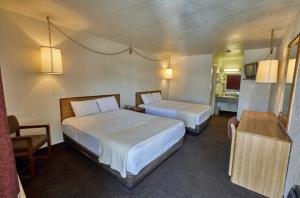 Queen Room with Two Queen Beds room in EZ 8 Motel San Jose I