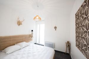 Appartements Le Hirvi - cocon zen et epure a 10min Vieux Lyon : photos des chambres